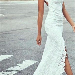 Brand New wedding dress! Never worn. Fitted lace A-line with front slit